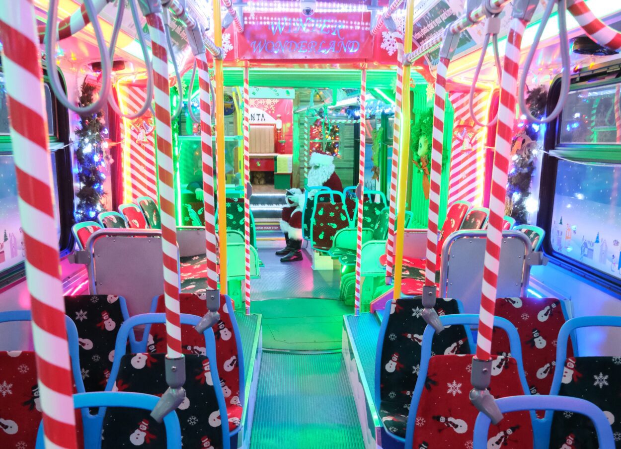 Red and Green decorations inside the holiday bus